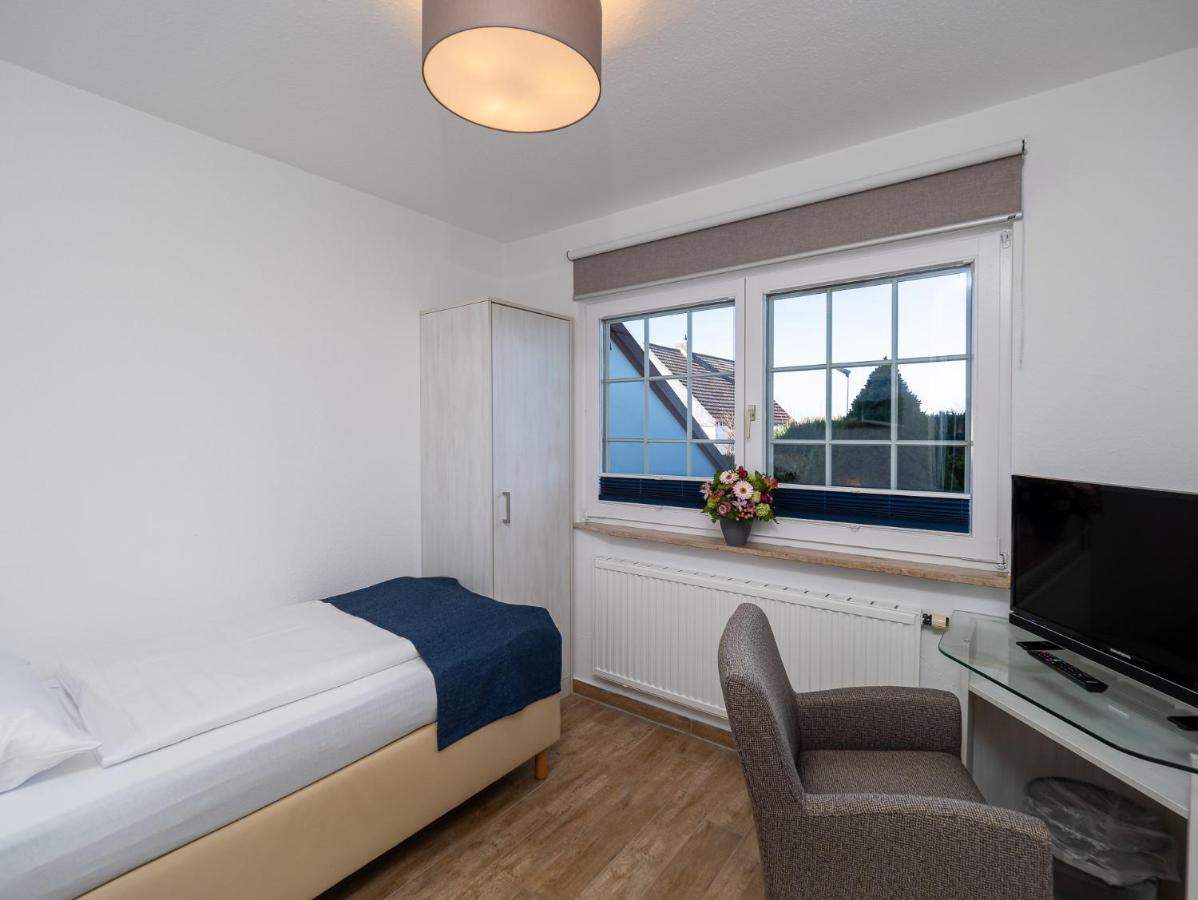 Hotel Tom'S Hus Heiligenhafen Extérieur photo