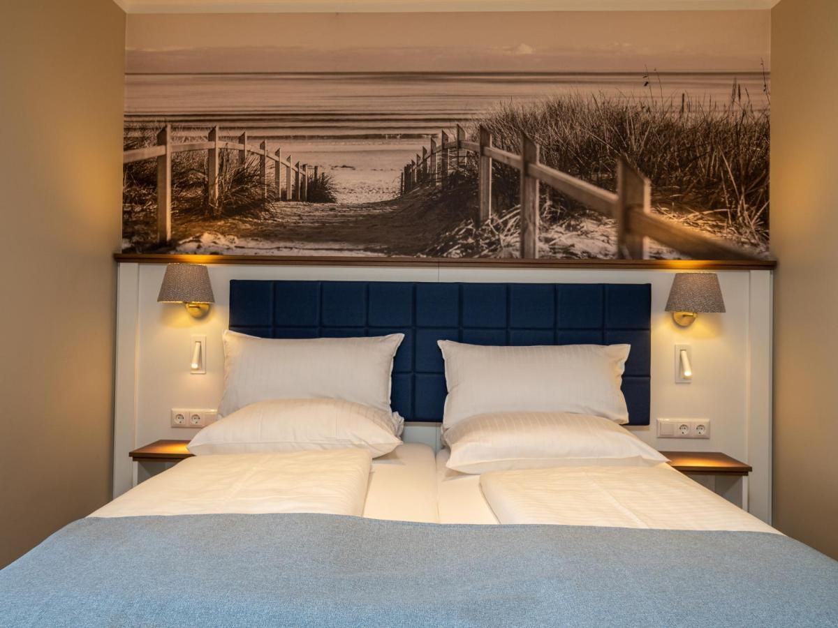 Hotel Tom'S Hus Heiligenhafen Extérieur photo
