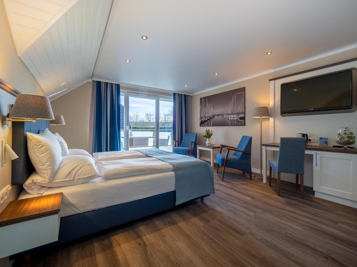 Hotel Tom'S Hus Heiligenhafen Extérieur photo