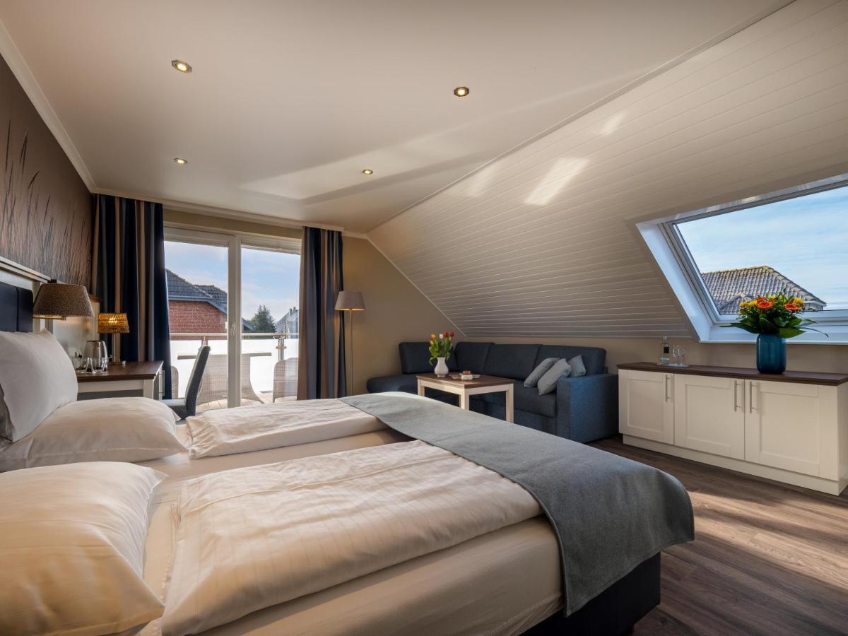 Hotel Tom'S Hus Heiligenhafen Extérieur photo